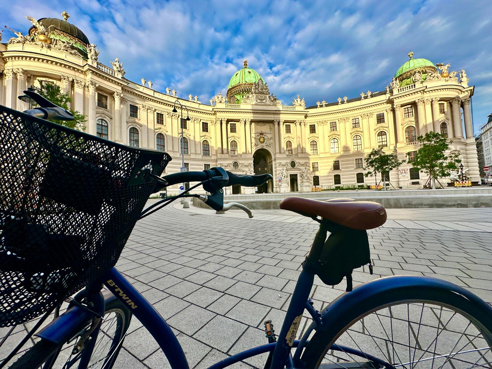 The €20 B'Twin bike with its basket parked in front of the Hofburg palace, Vienna